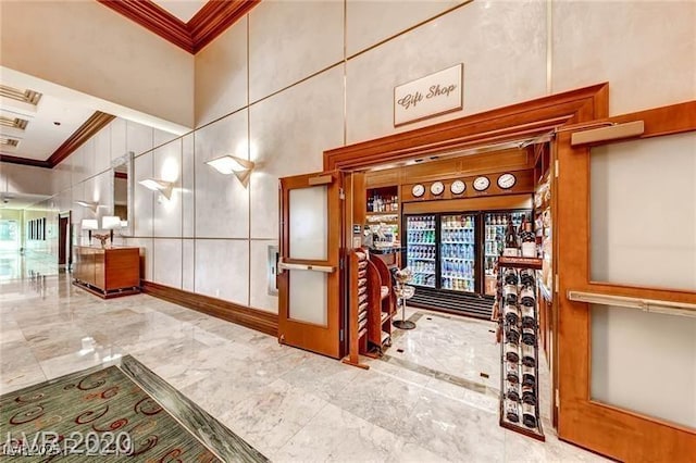 135 E Harmon Ave Unit 1703, Las Vegas, NV 89109 - community lobby featuring ornamental molding and a towering ceiling