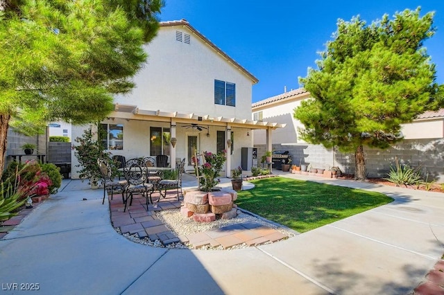 10413 Rising Harbor Ave, Las Vegas, NV 89129 - back of property with stucco siding, a patio, and a ceiling fan