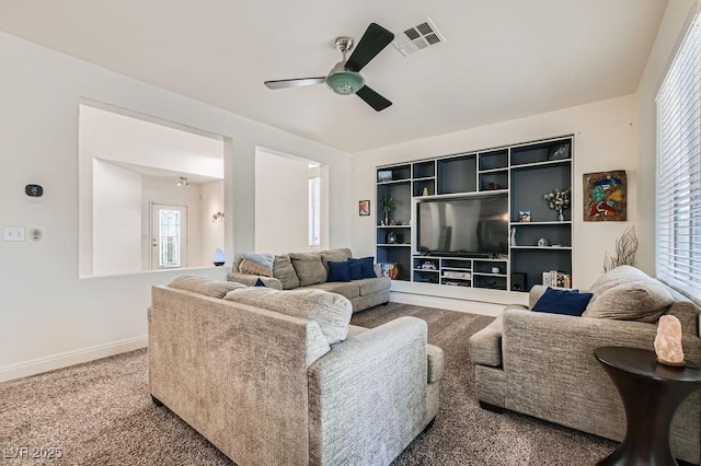 10413 Rising Harbor Ave, Las Vegas, NV 89129 - living area featuring a ceiling fan, plenty of natural light, and carpet flooring