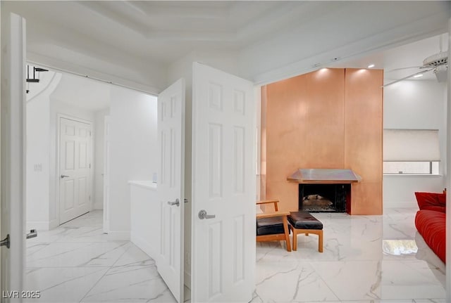 2851 Queens Courtyard Dr, Las Vegas, NV 89109 - hallway featuring light marble finish flooring and baseboards