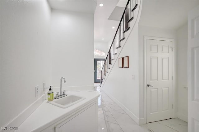 2851 Queens Courtyard Dr, Las Vegas, NV 89109 - bar featuring light marble finish floors, recessed lighting, and stairway