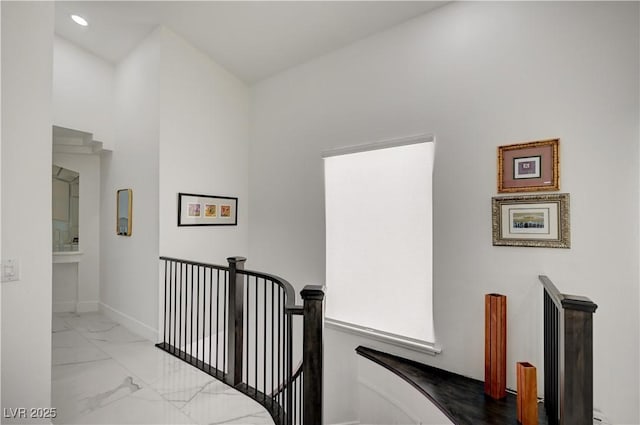 2851 Queens Courtyard Dr, Las Vegas, NV 89109 - hall featuring an upstairs landing, marble finish floors, and recessed lighting