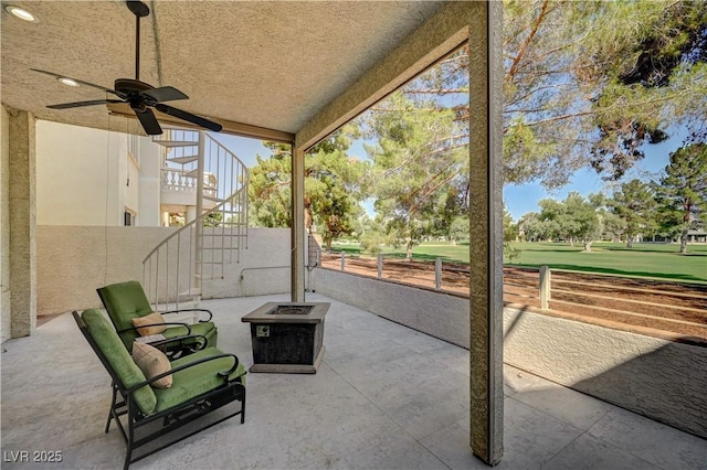 2851 Queens Courtyard Dr, Las Vegas, NV 89109 - view of patio / terrace with stairs and a ceiling fan