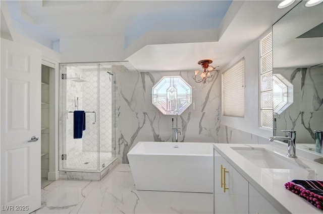 2851 Queens Courtyard Dr, Las Vegas, NV 89109 - full bath with vanity, a freestanding bath, a marble finish shower, and healthy amount of natural light