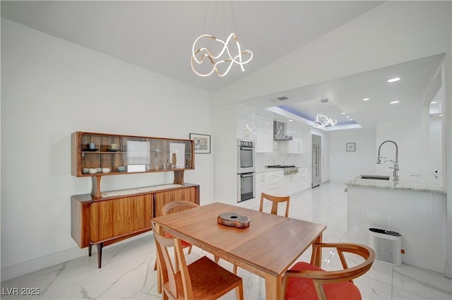 2851 Queens Courtyard Dr, Las Vegas, NV 89109 - dining room featuring light marble finish floors, a chandelier, and recessed lighting