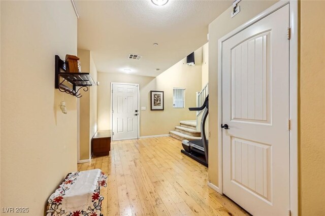 3168 Via Festiva, Henderson, NV 89044 - foyer with stairway and light wood-style flooring