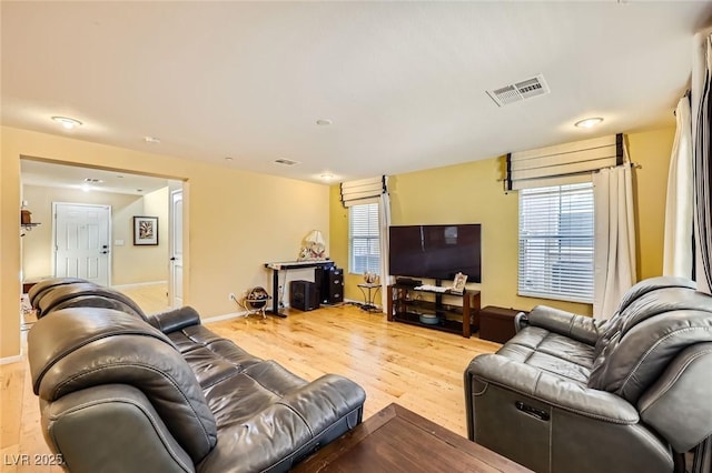 3168 Via Festiva, Henderson, NV 89044 - living room featuring wood finished floors and healthy amount of natural light