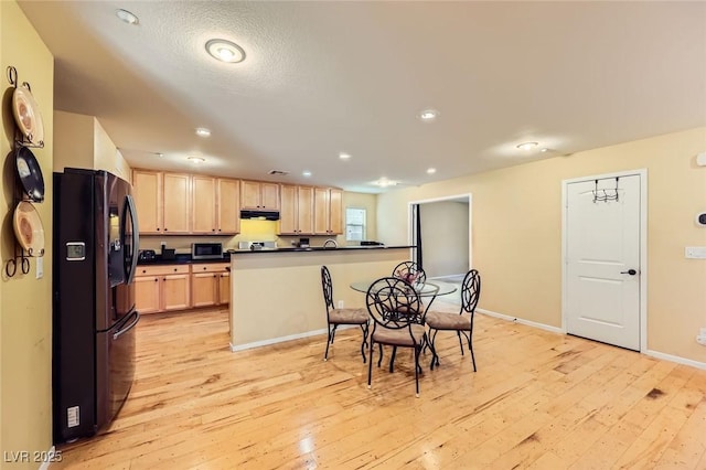 3168 Via Festiva, Henderson, NV 89044 - dining room with light wood finished floors and recessed lighting
