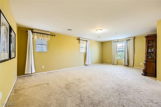 3168 Via Festiva, Henderson, NV 89044 - empty room with plenty of natural light and light colored carpet