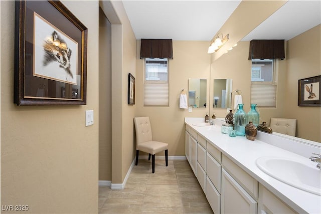 757 Bridle Path Ln, Mesquite, NV 89034 - full bathroom featuring double vanity and baseboards