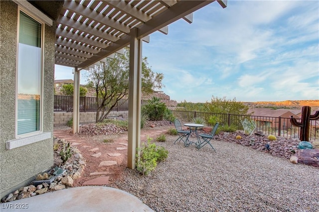 757 Bridle Path Ln, Mesquite, NV 89034 - fenced backyard featuring a pergola, a patio, and outdoor dining area