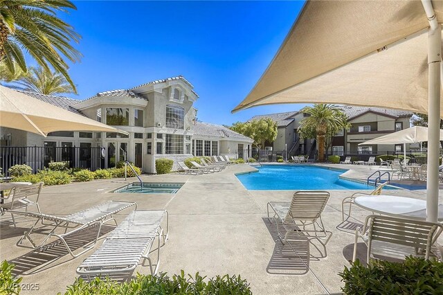 3905 Sweet Pine St Unit 102, Las Vegas, NV 89108 - community pool with a patio area