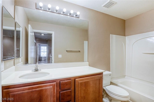 3905 Sweet Pine St Unit 102, Las Vegas, NV 89108 - bathroom with vanity, a textured wall, and tub / shower combination