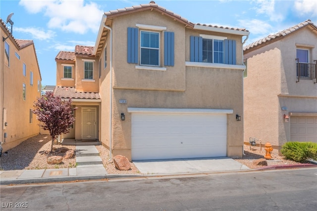 7553 Virginia Dale St, Las Vegas, NV 89131 - view of front of house with a tile roof, an attached garage, stucco siding, and driveway