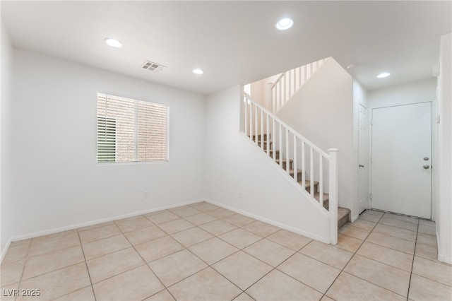7553 Virginia Dale St, Las Vegas, NV 89131 - tiled empty room featuring stairs and recessed lighting