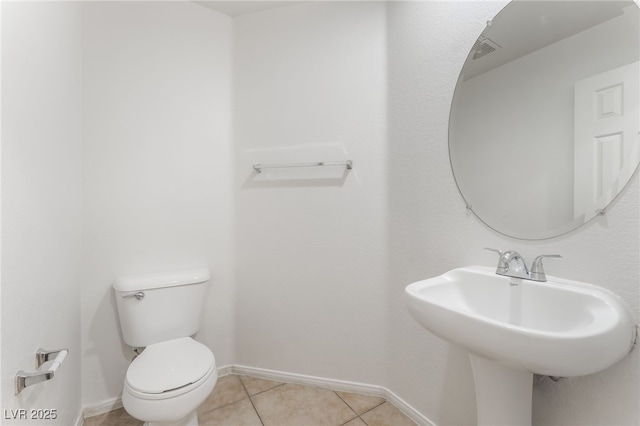 7553 Virginia Dale St, Las Vegas, NV 89131 - half bathroom with toilet and tile patterned floors
