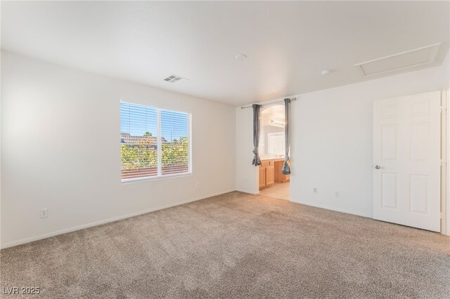 7553 Virginia Dale St, Las Vegas, NV 89131 - unfurnished bedroom featuring light colored carpet and ensuite bathroom
