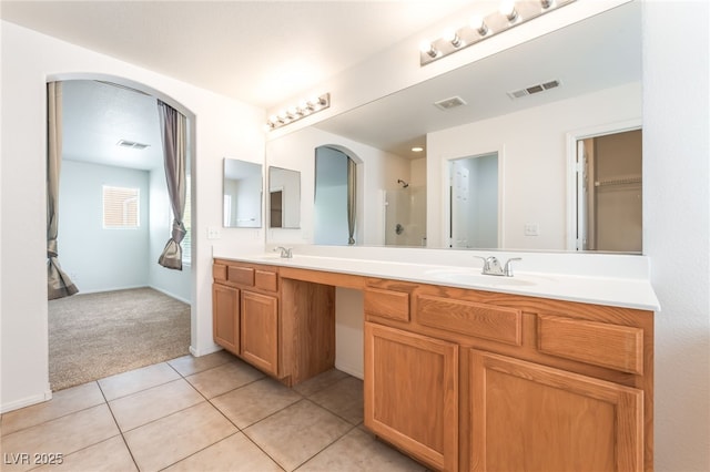 7553 Virginia Dale St, Las Vegas, NV 89131 - full bath with double vanity and tile patterned floors