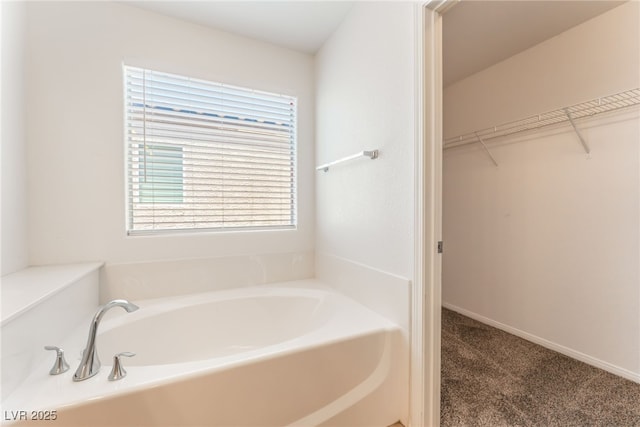 7553 Virginia Dale St, Las Vegas, NV 89131 - full bath featuring a bath and a walk in closet