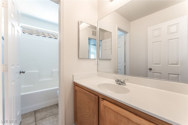 7553 Virginia Dale St, Las Vegas, NV 89131 - full bathroom featuring vanity, tile patterned floors, and shower / tub combination