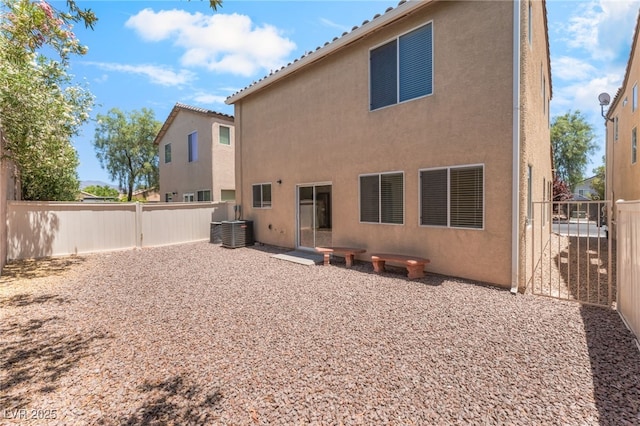 7553 Virginia Dale St, Las Vegas, NV 89131 - rear view of property featuring a fenced backyard and stucco siding
