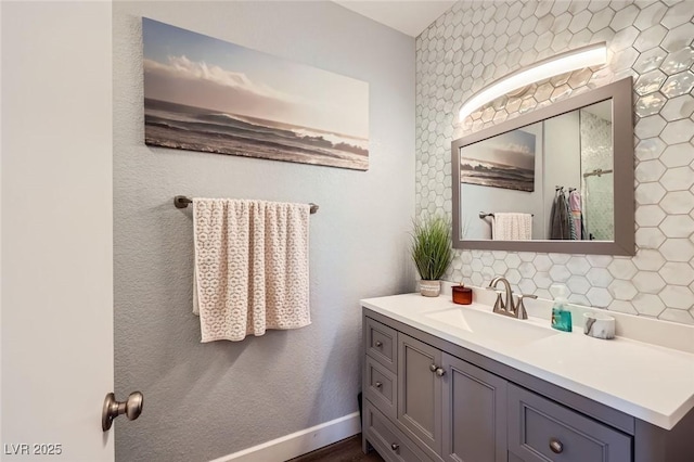 251 S Green Valley Pkwy Unit 3222, Henderson, NV 89012 - bathroom featuring vanity and tasteful backsplash