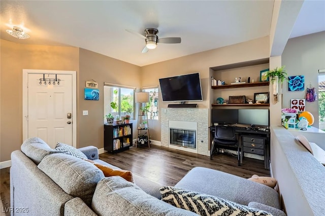 251 S Green Valley Pkwy Unit 3222, Henderson, NV 89012 - living area featuring wood finished floors, a ceiling fan, and a glass covered fireplace