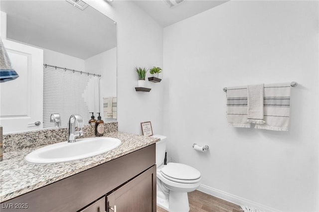 12280 Golden Wreath Rd Unit 3, Las Vegas, NV 89183 - bathroom featuring vanity and wood finished floors