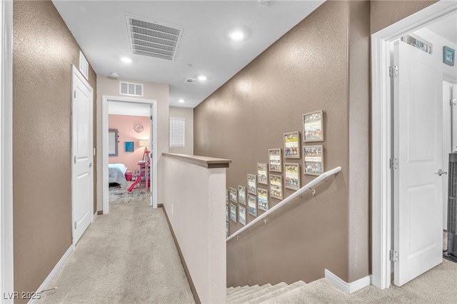 12280 Golden Wreath Rd Unit 3, Las Vegas, NV 89183 - corridor with an upstairs landing, carpet, recessed lighting, and a textured wall