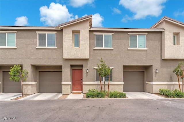 12280 Golden Wreath Rd Unit 3, Las Vegas, NV 89183 - multi unit property with stucco siding and a garage