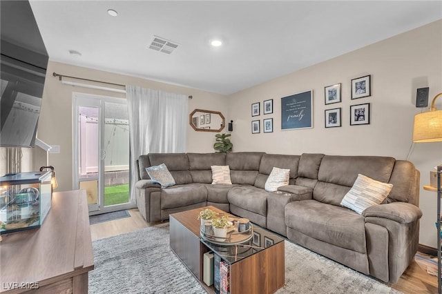 12280 Golden Wreath Rd Unit 3, Las Vegas, NV 89183 - living room with wood finished floors and recessed lighting