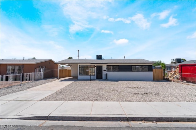 1648 J St, Las Vegas, NV 89106 - ranch-style home featuring a gate, concrete driveway, a fenced front yard, and stucco siding