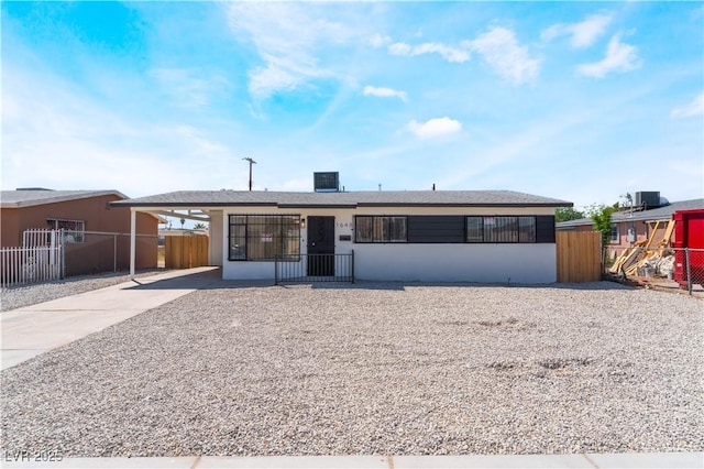 1648 J St, Las Vegas, NV 89106 - single story home featuring driveway, an attached carport, and stucco siding