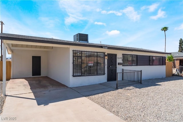 1648 J St, Las Vegas, NV 89106 - view of front of home with stucco siding and driveway