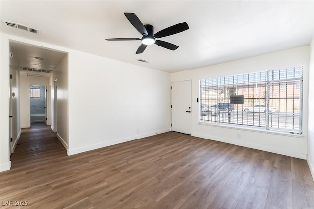 1648 J St, Las Vegas, NV 89106 - unfurnished room featuring wood finished floors and ceiling fan