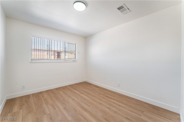 1648 J St, Las Vegas, NV 89106 - empty room featuring light wood-type flooring and baseboards
