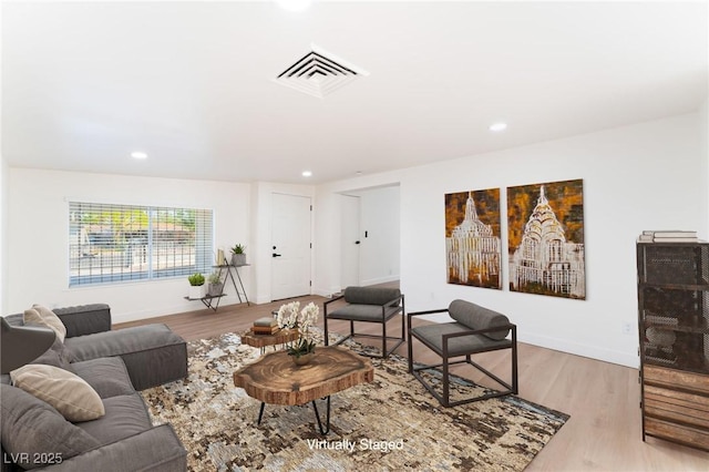3320 Osage Ave, Las Vegas, NV 89101 - living area with light wood finished floors and recessed lighting