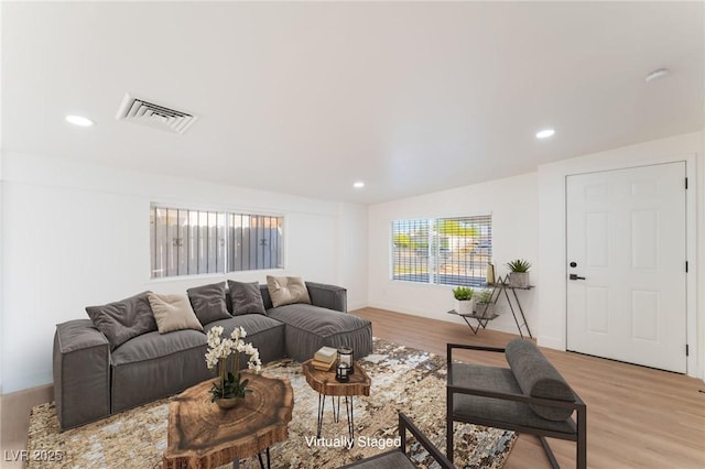 3320 Osage Ave, Las Vegas, NV 89101 - living area with light wood-type flooring and recessed lighting