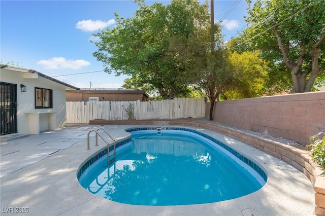 3320 Osage Ave, Las Vegas, NV 89101 - view of pool with a fenced backyard and a patio