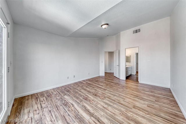 2766 Red Vista Ct, Henderson, NV 89074 - unfurnished bedroom featuring light wood-style floors and ensuite bath