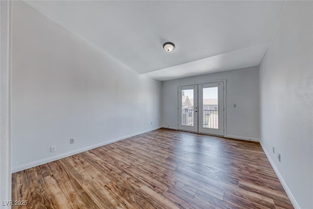 2766 Red Vista Ct, Henderson, NV 89074 - spare room featuring french doors and wood finished floors
