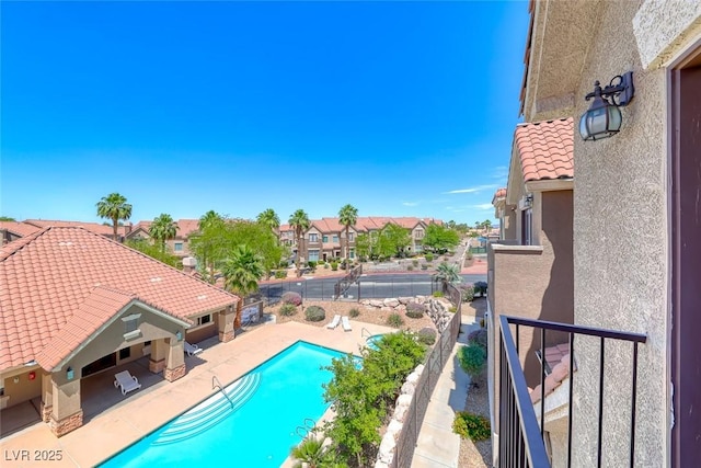 2766 Red Vista Ct, Henderson, NV 89074 - community pool featuring a residential view, a fenced backyard, and a patio area