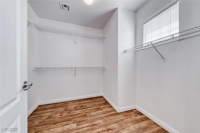 2766 Red Vista Ct, Henderson, NV 89074 - spacious closet with wood finished floors