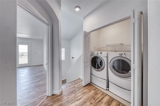 2766 Red Vista Ct, Henderson, NV 89074 - laundry room with light wood finished floors and washing machine and dryer