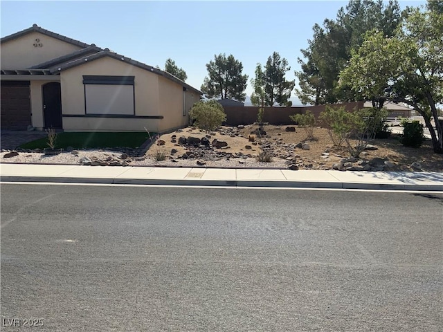 5363 S Juneau St, Pahrump, NV 89061 - view of side of property featuring stucco siding