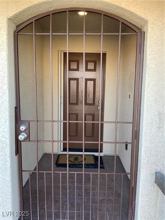 5363 S Juneau St, Pahrump, NV 89061 - property entrance with stucco siding
