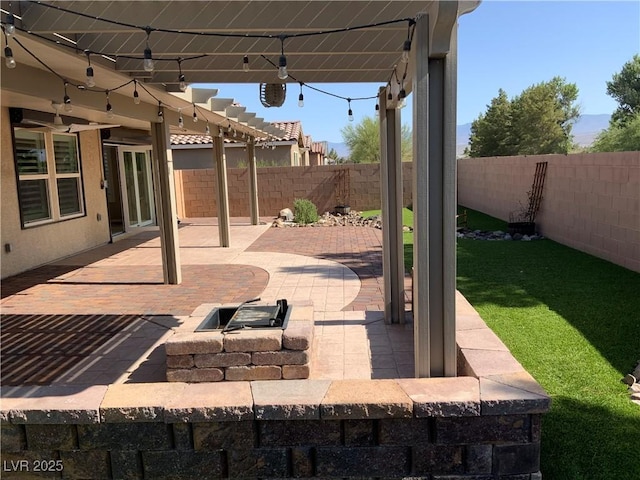 5363 S Juneau St, Pahrump, NV 89061 - fenced backyard featuring a patio area