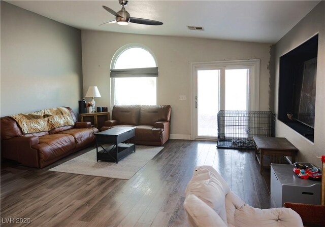 4848 Cutting Diamond Ct, North Las Vegas, NV 89081 - living room featuring ceiling fan, wood finished floors, and vaulted ceiling