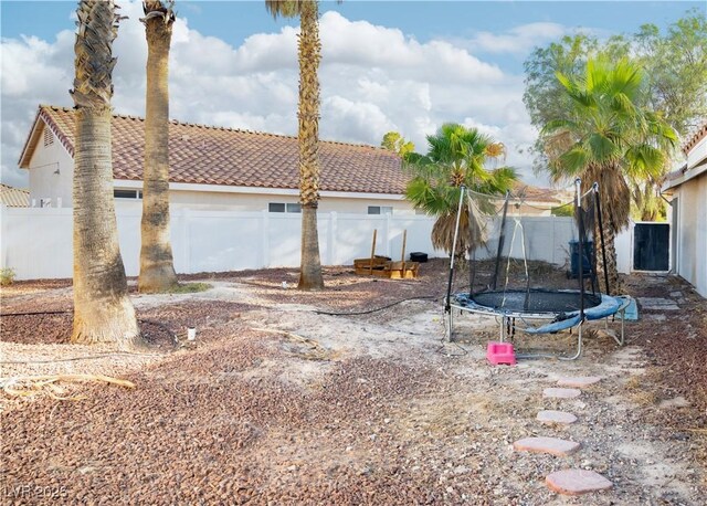 4848 Cutting Diamond Ct, North Las Vegas, NV 89081 - view of yard featuring a trampoline