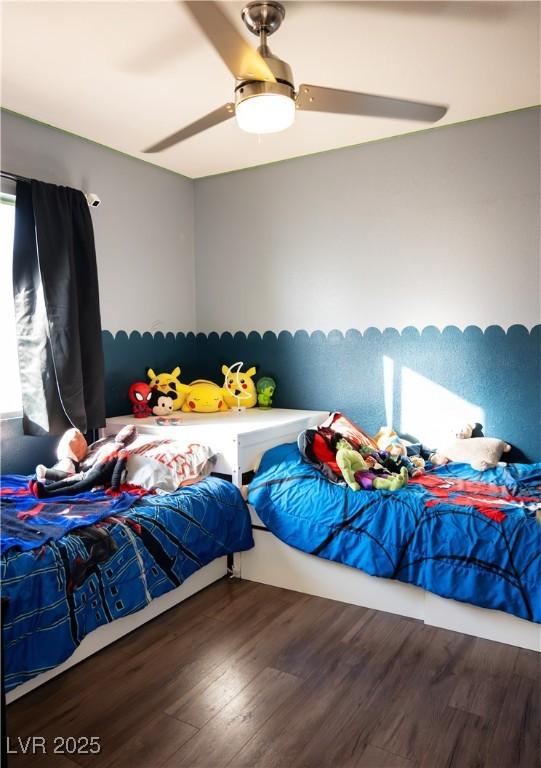 4848 Cutting Diamond Ct, North Las Vegas, NV 89081 - bedroom featuring wood finished floors and ceiling fan